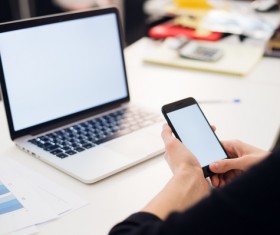 Man using laptop and smartphone Stock Photo 06