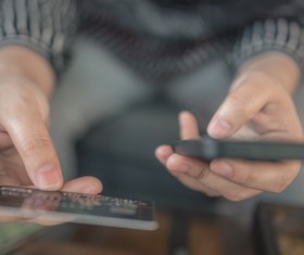 Man using laptop and smartphone Stock Photo 07