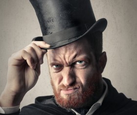 Man wearing a black top hat Stock Photo