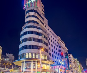 Modern outlet mall in city at night Stock Photo