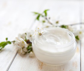 Moisturizers and creams and flowers Stock Photo