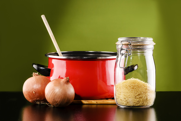 Onion and soup pot Stock Photo