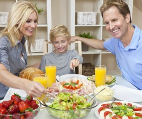 Parents who take care of their children to eat Stock Photo