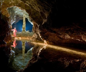 People exploring the cave Stock Photo 02