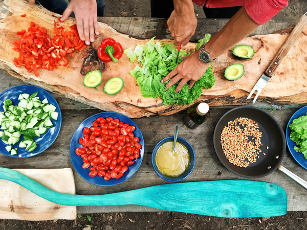 People preparing nutritious vegetable cuisine Stock Photo