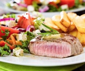 Steak and side dishes Stock Photo
