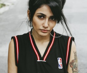 Stylish young tattoo girl in casual style Stock Photo