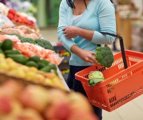 Supermarket woman buying food Stock Photo 04