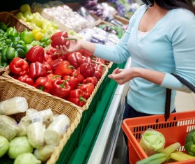 Supermarket woman buying food Stock Photo 06