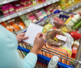 Supermarket woman buying food Stock Photo 07