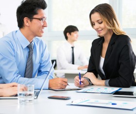 Talking with female customer Stock Photo