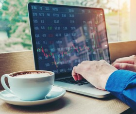 Using laptops to stocks Stock Photo