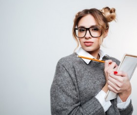 Wearing broad-brimmed glasses girl looking information Stock Photo 01