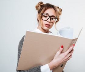 Wearing broad-brimmed glasses girl looking information Stock Photo 02