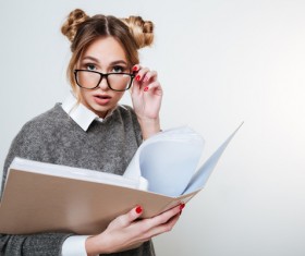Wearing broad-brimmed glasses girl looking information Stock Photo 03