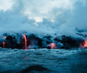 White smoke lava emerging from the volcano Stock Photo