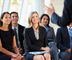 Woman attending business market meeting Stock Photo 01