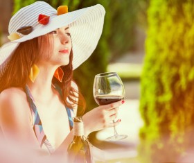 Woman drinking red wine Stock Photo