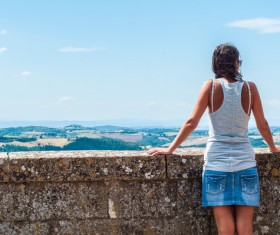 Woman looking at distant landscape Stock Photo