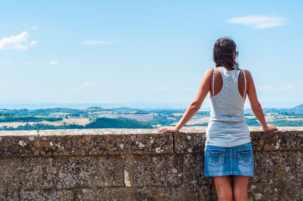 Woman looking at distant landscape Stock Photo