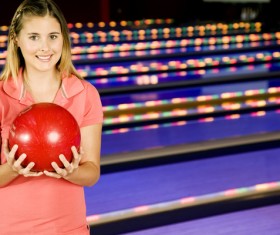 Woman playing bowling Stock Photo 02