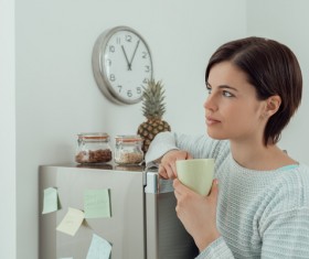 Woman resting at noon for coffee Stock Photo