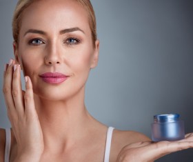 Woman rubs moisturizers and creams Stock Photo 05
