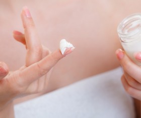 Woman rubs moisturizers and creams Stock Photo 06