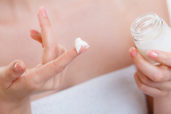 Woman rubs moisturizers and creams Stock Photo 06