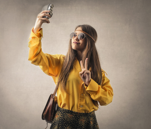 Woman using camera selfie Stock Photo