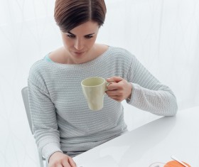Woman using laptop online at home Stock Photo 01