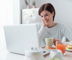 Woman using laptop online at home Stock Photo 04