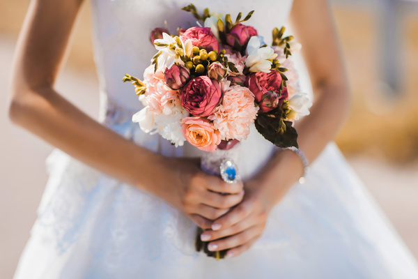 Womans bouquet in hands Stock Photo 01