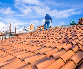 Worker repairing the roof Stock Photo 04