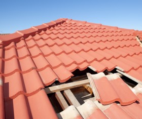 Worker repairing the roof Stock Photo 06