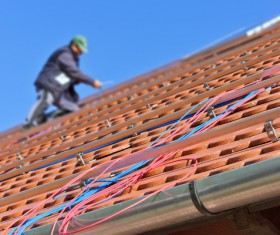 Worker repairing the roof Stock Photo 10