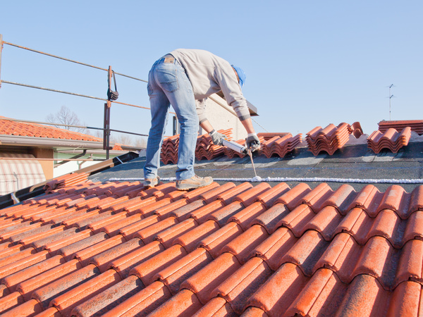 Worker repairing the roof Stock Photo 11