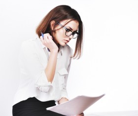 Young beautiful office female staff checking information Stock Photo 04