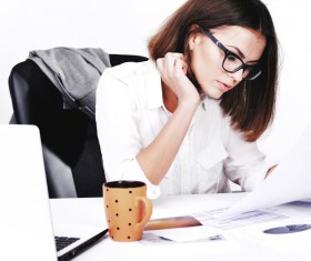 Young beautiful office female staff checking information Stock Photo 08