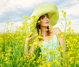 Young girl posing in flowers Stock Photo 01