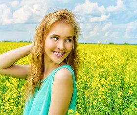 Young girl posing in flowers Stock Photo 05
