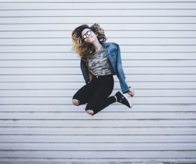 Young girl posing with jumping style Stock Photo