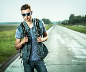Young man posing on the road Stock Photo 01