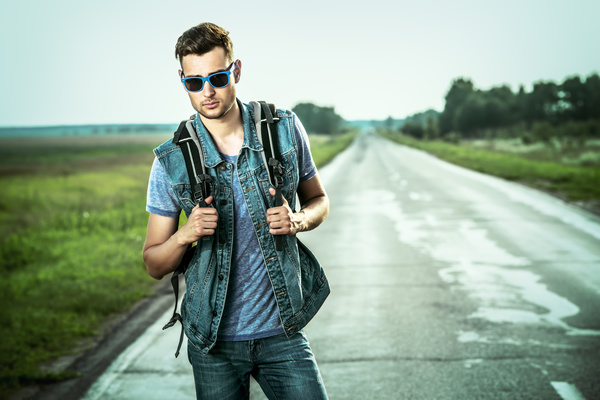 Young man posing on the road Stock Photo 01
