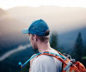 Young man traveling with backpack Stock Photo