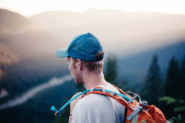 Young man traveling with backpack Stock Photo