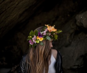 Young woman posing with flower wreath Stock Photo