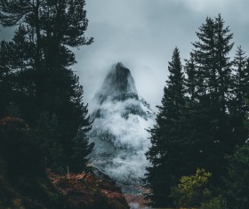 asphalt pathway on cloudy mountain view Stock Photo