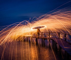 beautiful sparkling fireworks at dusk Stock Photo