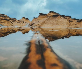 calm water surface on sandy hill Stock Photo